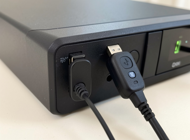 USB Zigbee and Z-Wave coordinator sticks plugged into a small Home Assistant server