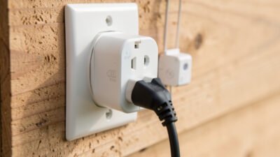 Outdoor smart plug and temperature sensor controlling a coop heater
